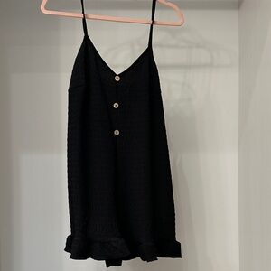 Black Sleeveless Buttoned romper. Pink Lily small. Like new